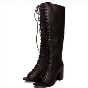 Knee high lace up boots